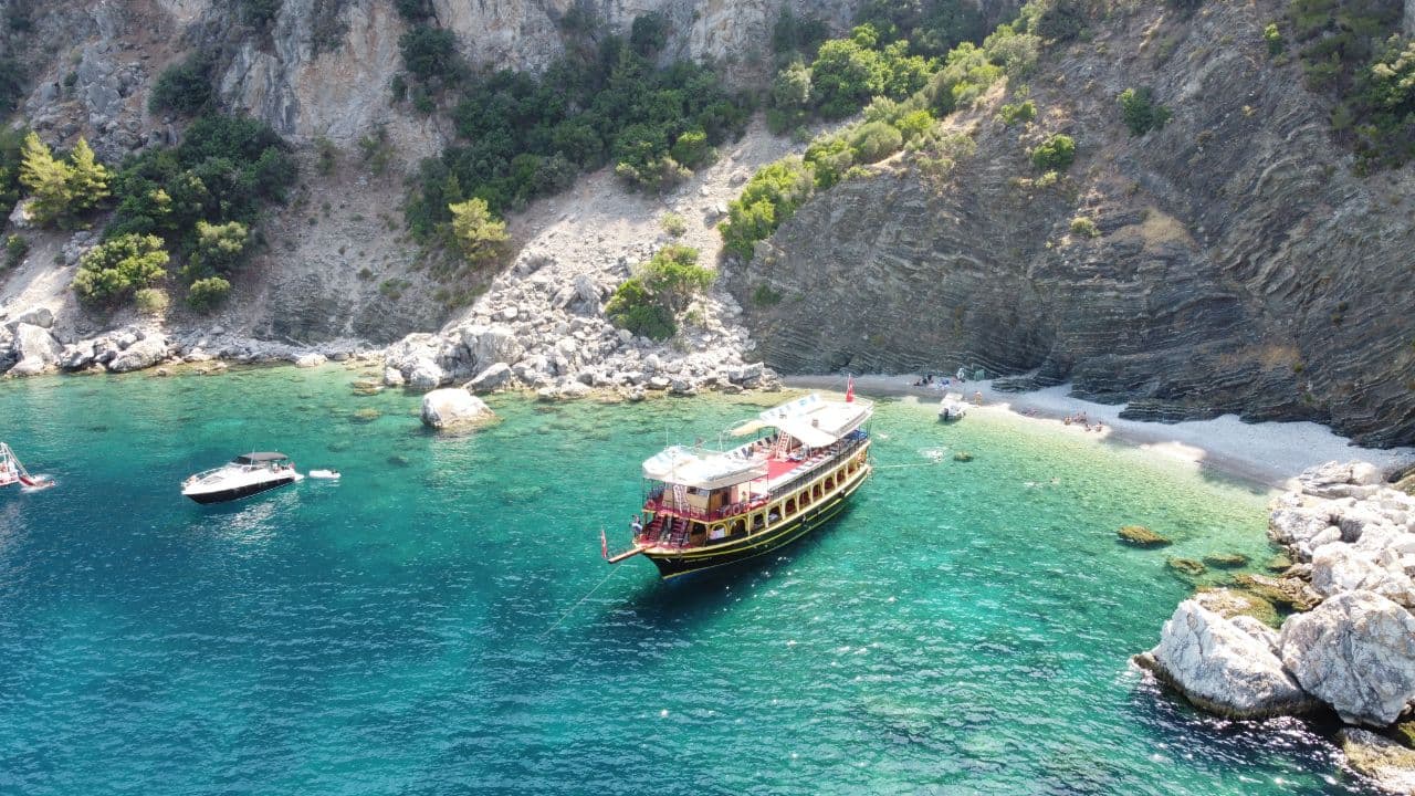 Paradise Island (Cennet Adası) boat tour from Marmaris — traditional gulet anchored in a turquoise bay